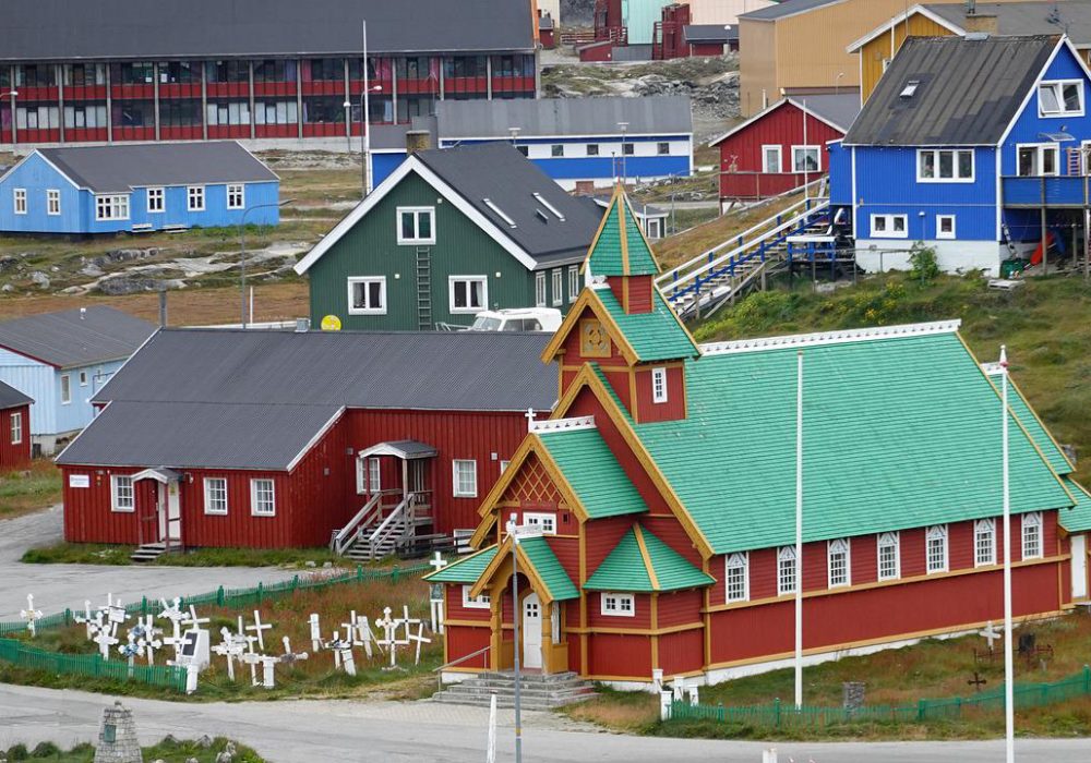 Housing and a church in Paamiut, Greenland. 
Photo: Dassel/Pixabay