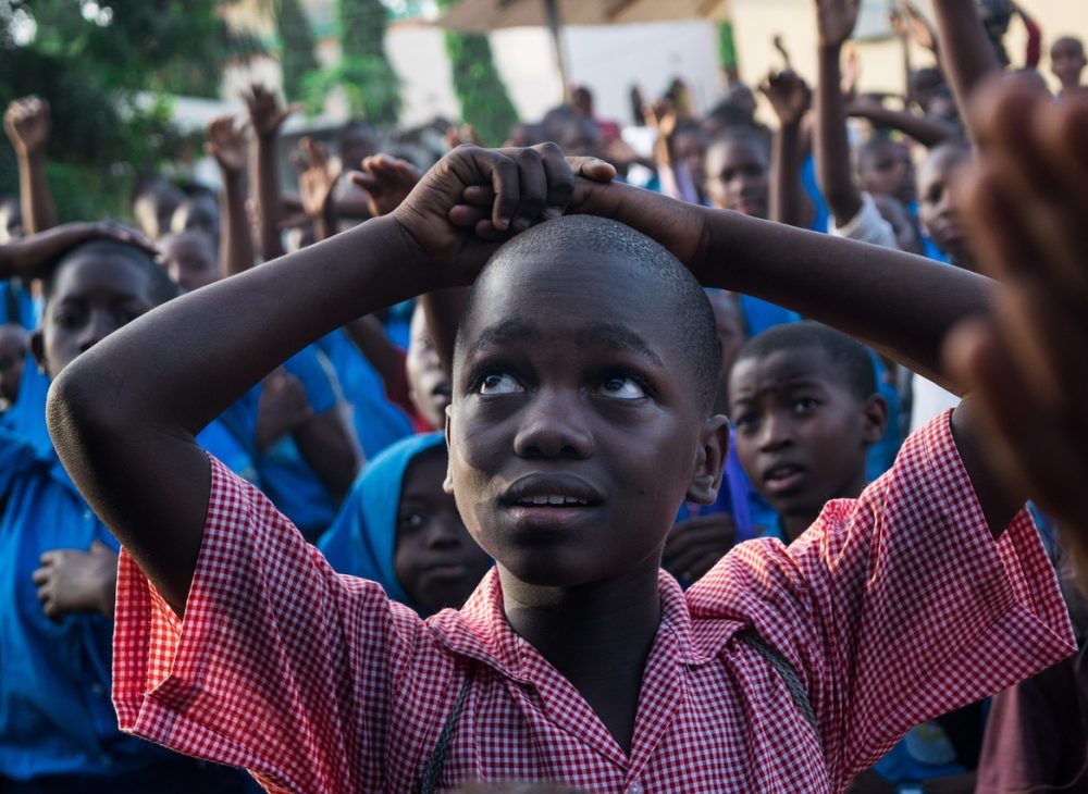 A Kenyan school boy among his peers. 
Photo: Ian Ingalula/Pixabay